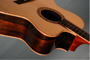 đàn guitar gỗ nguyên khối và đàn guitar gỗ ép