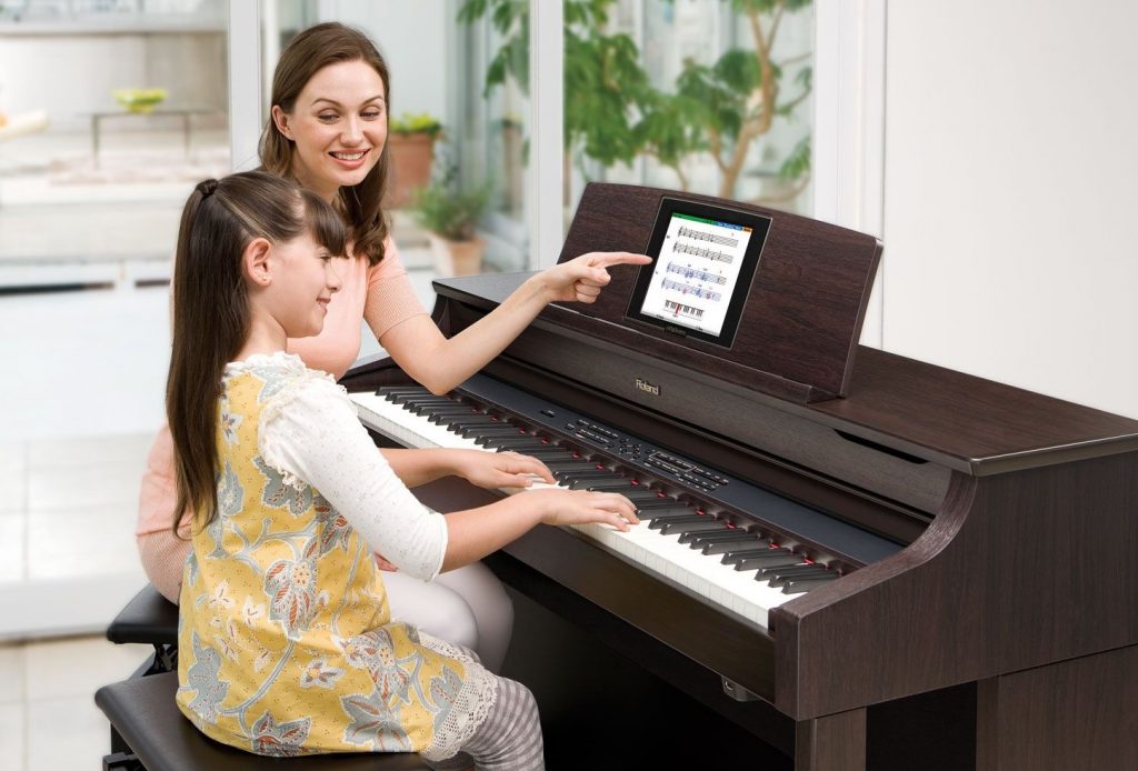 tư vấn mua đàn piano cho bé 